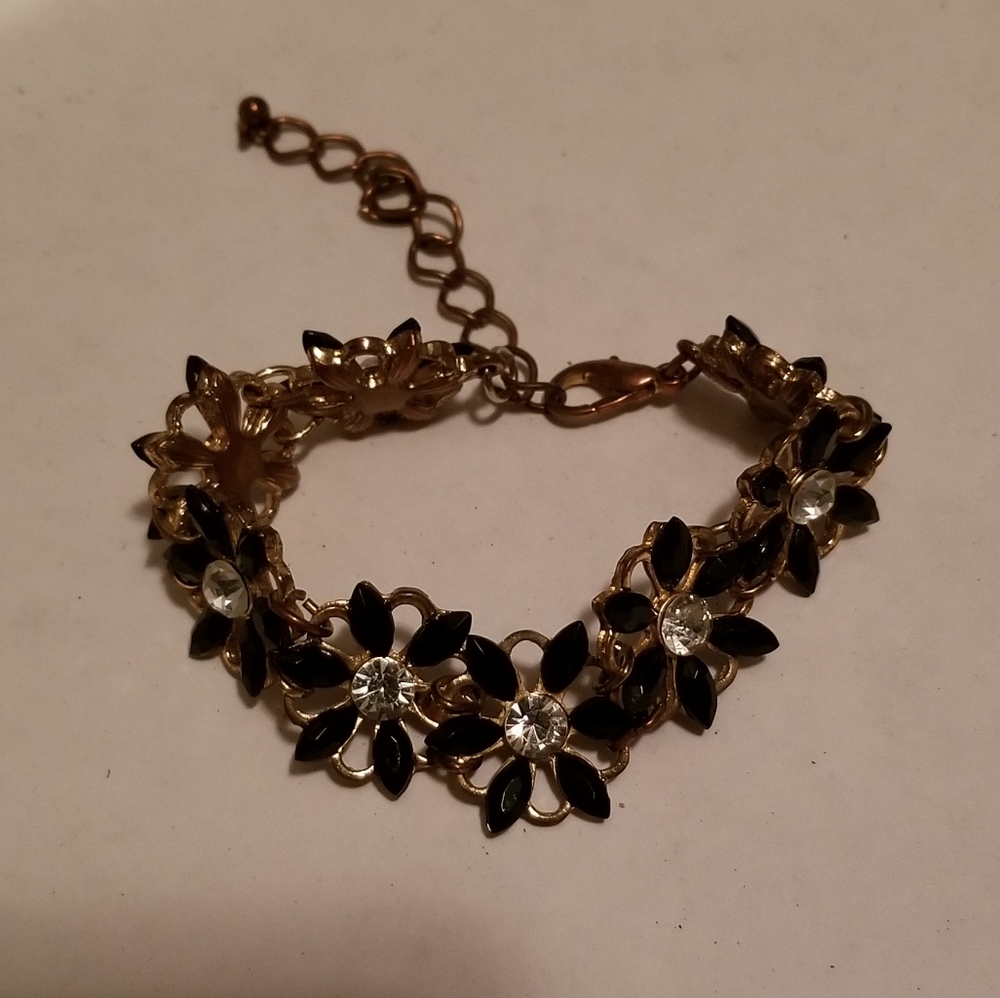 Gold plated black flower bracelet
